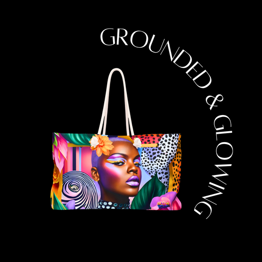 Colorful tote bag with artistic design of a woman's face on a black background with 'GROUNDED & GLOWING' text.