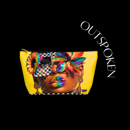 Colorful makeup bag with a face design and 'OUTSPOKEN' text on a black background