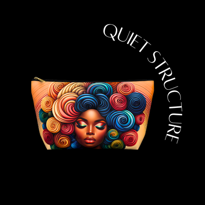 Colorful pouch with artistic depiction of a face and 'Quiet Structure' branding on a black background