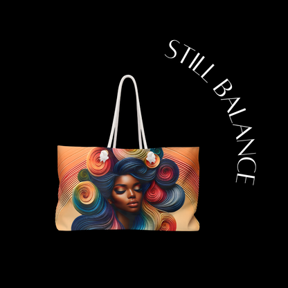 Tote bag with colorful hair design and 'STILL BALANCE' text on a black background