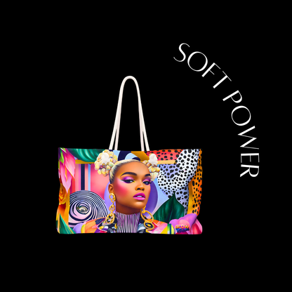 Colorful tote bag with a design of a woman's face and 'SOFT POWER' text on a black background